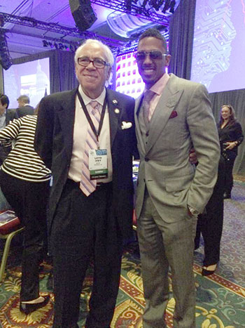 TV host Nick Cannon with MTX Audio head Loyd Ivey